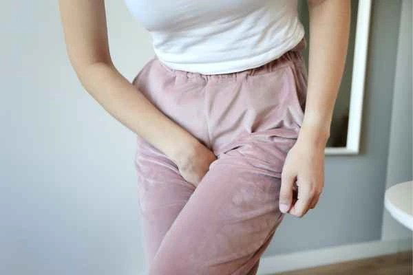 older woman running to the toilet because of urinary incontinence Redbourn